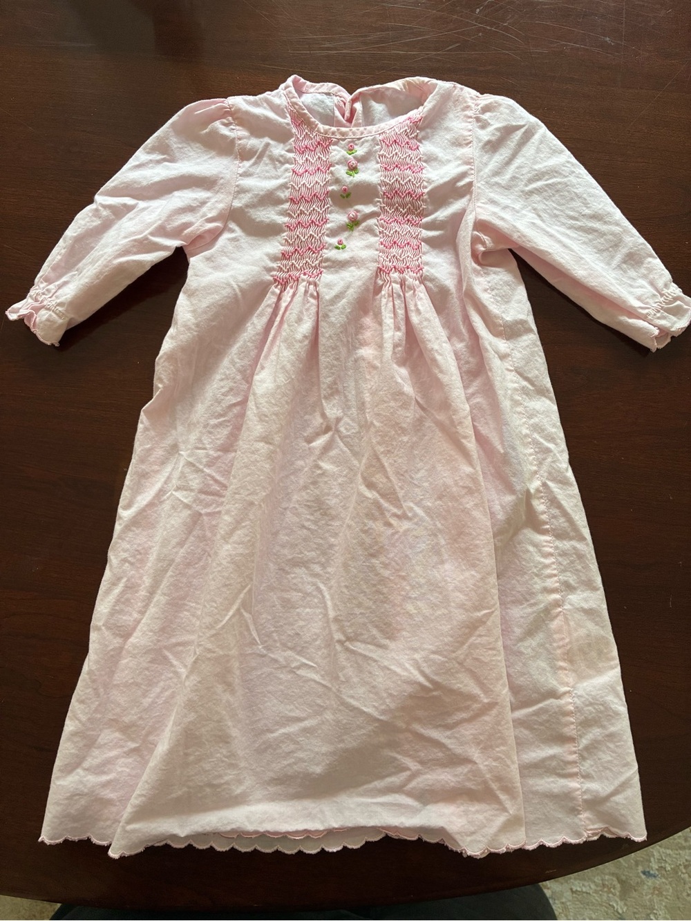 Beautiful vintage smocked pink baby gown in excellent condition.